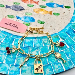 Juicy Couture Gold Plated Cherry, Padlock & Key Charm Bracelet