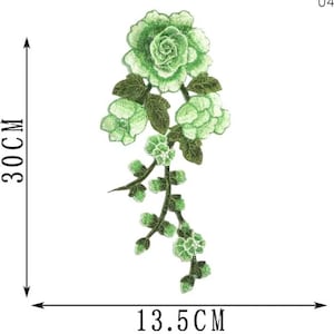 May include: Embroidered floral applique in shades of green. The design features a large rose and several smaller buds, with a total length of 30 cm (11.8 inches) and a width of 13.5 cm (5.3 inches).