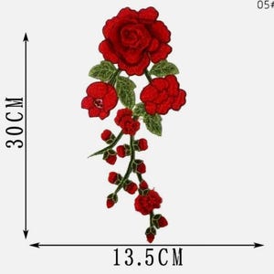 May include: Embroidered red rose patch, approximately 11.8 inches long and 5.3 inches wide. The patch features a detailed design of a large rose, smaller buds, and green leaves. The number "05#" is in the upper right corner.