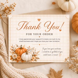 May include: A rectangular thank you card with a light beige plaid background. The text reads Thank You! FOR YOUR ORDER, followed by a message of appreciation and a request for a review. The card features illustrations of orange and white pumpkins.