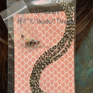 10 natural grizzly feathers in a clear poly bag shown with 10 mixed silicone lined hair extension beads and blue floss threader. This is the 8 to 11 inch bundle