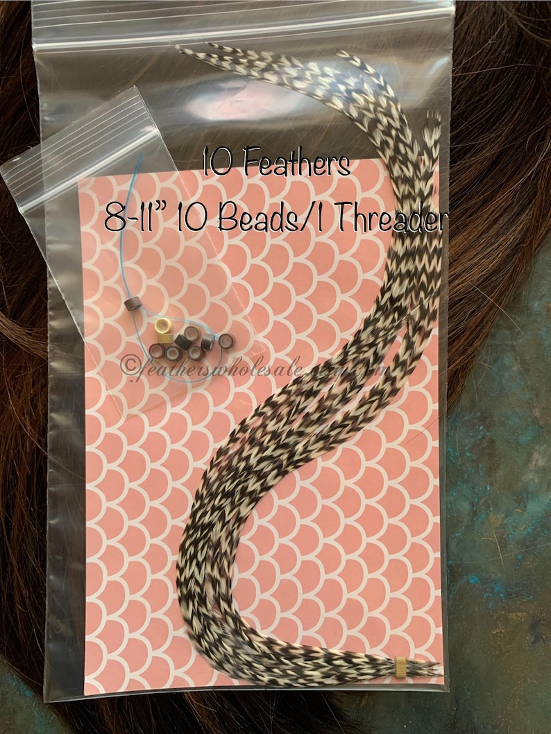 10 natural grizzly feathers in a clear poly bag shown with 10 mixed silicone lined hair extension beads and blue floss threader. This is the 8 to 11 inch bundle