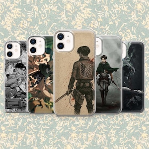 May include: Five phone cases with different designs featuring characters from the anime series Attack on Titan. The cases display various illustrations in black and white, sepia, and full color, showcasing action poses and character portraits.