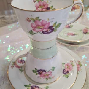 Attractive, Floral Sutherland Bone China Tea Cups, Saucers, and Side Plates.
