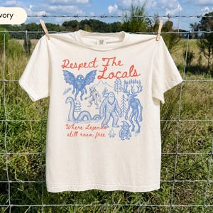 Respect The Locals Cryptid Shirt, Comfort Colors® Bigfoot Mothman Nessie Tee, Vintage Cryptozoology Graphic Shirt, Folklore Gift