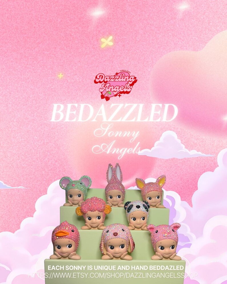 May include: A collection of bedazzled Sonny Angels figurines, each with unique animal-themed hats and accessories. The figurines are displayed on a tiered platform against a pink background with the text "BEDAZZLED Sonny Angels". The Dazzling Angels logo is also visible.