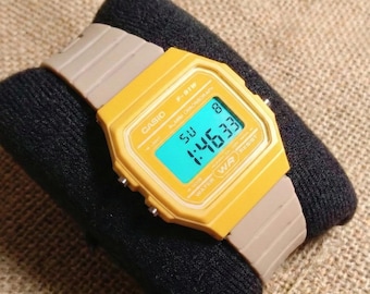 Custom Casio F91W Digital Watch (F-91WC-9AEF): Yellow case, Beige strap, Green display and LED