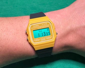 Custom Casio F91W Digital Watch (F-91WC-9AEF): Yellow case, Grey strap, Green display and LED