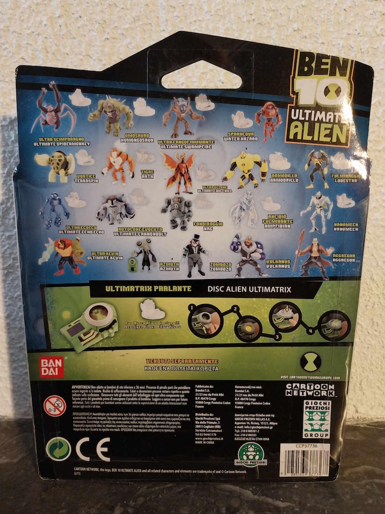 May include: A Ben 10 Ultimate Alien action figure package. The package features various action figures of different characters, with the words "Ultimate Alien" prominently displayed. The package also includes the Cartoon Network logo.