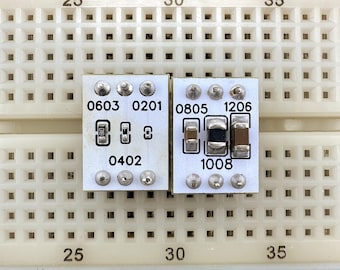 Adapterplatine QFP44,LQFP44,MQFP44,PQFP44,TQFP44,VQFP44 mit 0.80mm Rastermaß auf 4 x IDC2x6 Steckverbinder Adapterplatine QFP44,LQFP44,MQFP44,PQFP44,TQFP44,VQFP44 mit 0.80mm Rastermaß auf 4 x IDC2x6 Steckverbinder