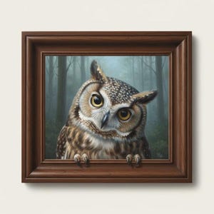 May include: A framed painting of an owl with large yellow eyes and brown and white feathers. The owl is peering out from a dark brown wooden frame. The background shows a misty forest with tall trees.