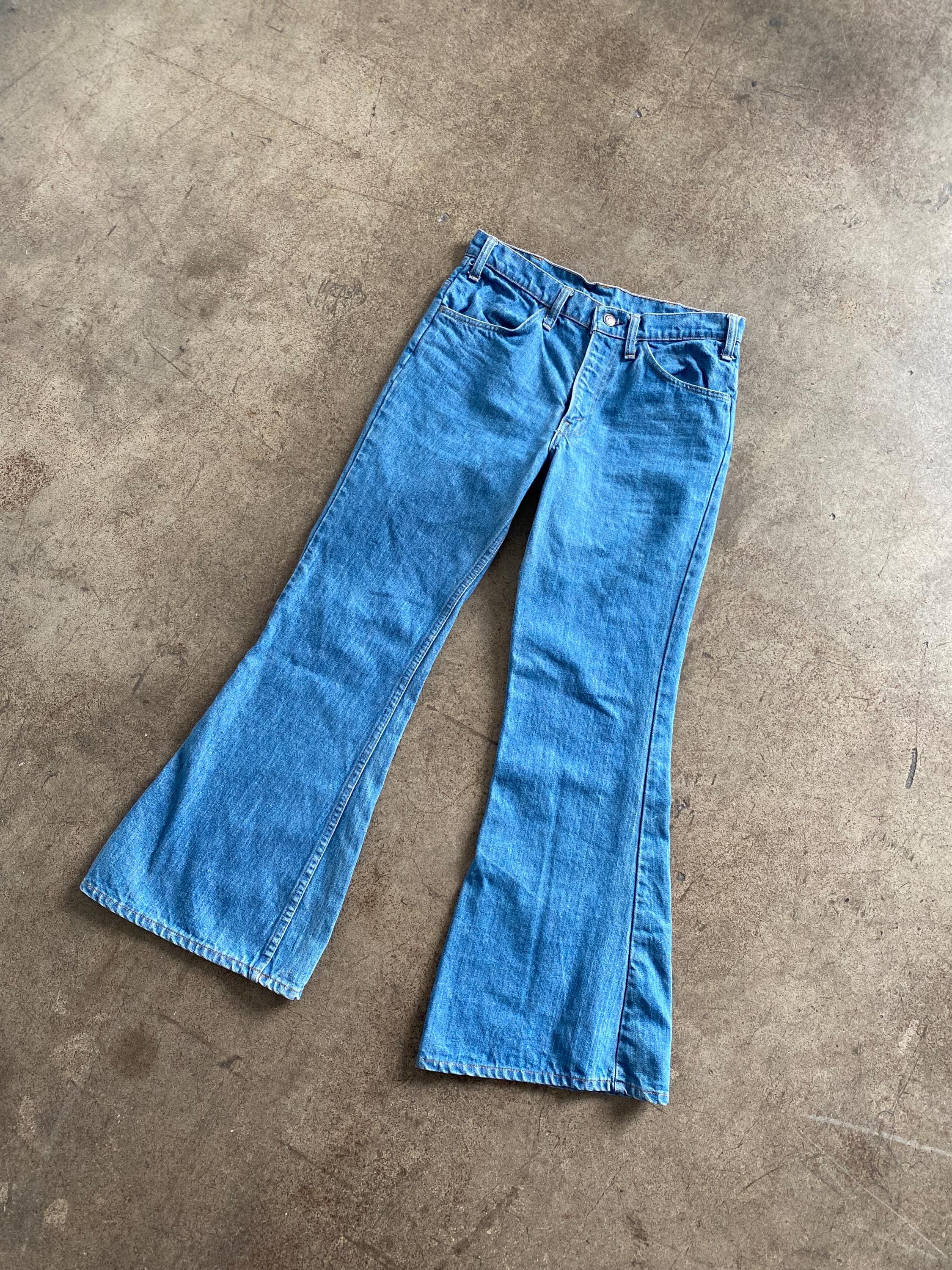 1980s Levis Orange Tab Jeans Bell Bottom Faded 28x30 Vintage