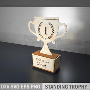 May include: Wooden trophy with a laurel wreath and the number 1, set on a rectangular base. The base has the words "Add your Text" engraved on it. The trophy is a light brown color and is labeled "STANDING TROPHY".