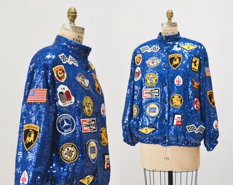 80s 90s Vintage Blue Sequin Bomber Jacket Race Car Patches Jeanette Kastenberg St martin Small Medium Mercedes Benz Porche Maserati Pop Art