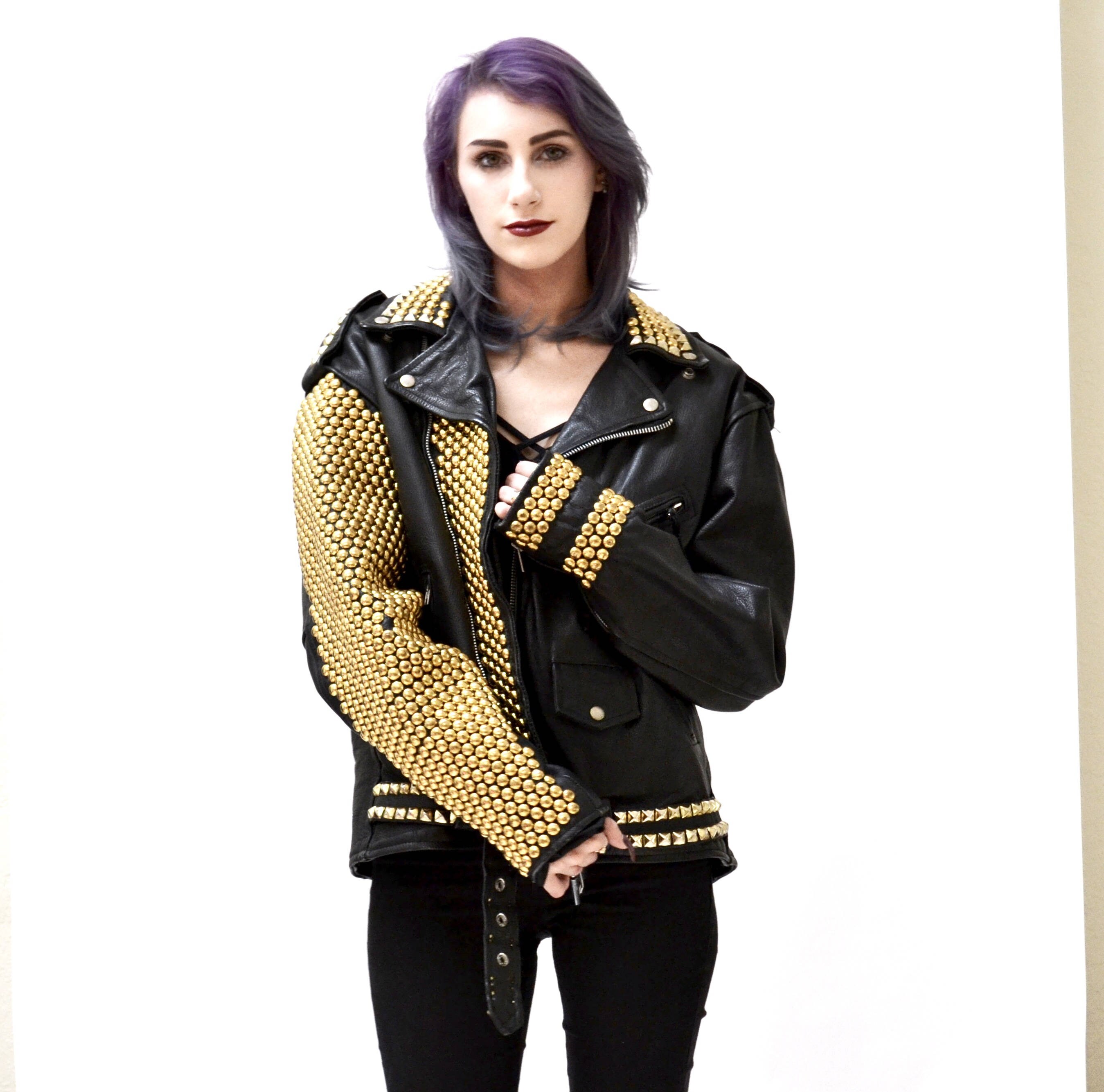 black leather jacket with gold studs