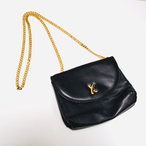 Bolso de mano vintage de piel negra de los años 90 de Paloma Picasso // Bolso bandolera de piel negra con cadena dorada Bolso pequeño de piel negra fabricado en Italia
