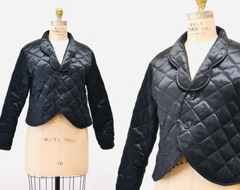 ヴィンテージの光沢のあるブラックキルティングフード付きジップ