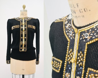 Suéter vintage glam dos anos 80/90 com lantejoulas e miçangas douradas, tamanho pequeno/médio, da Elizabeth New York.
