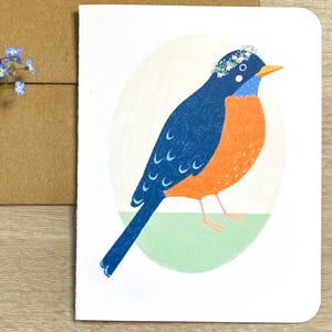 Carte de voeux rouge-gorge – oiseau des bois avec couronne de fleurs – carte nature vierge pour toutes les occasions