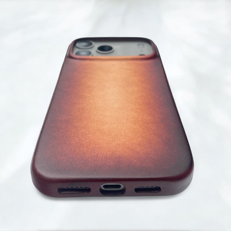 Bottom view of the case with cutouts for charging port and speakers, ensuring full access and functionality
