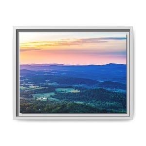 Layers of Light, A Mountain Sunrise. Soft pastels stretch across the sky as rolling hills awaken beneath a radiant dawn. Mountain view art.