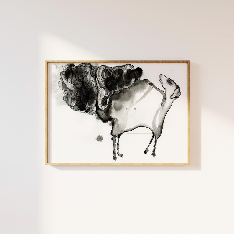 May include: A framed horizontal art print featuring an abstract ink wash illustration of a four-legged creature. The artwork uses varying shades of black and gray ink on a white background, with fluid, swirling lines and organic shapes.