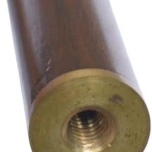 May include: Close-up of a wooden object with a brass fitting. The cylindrical body is a dark brown color, and the brass fitting has a threaded hole in the center. The object appears to be a component of a larger item.