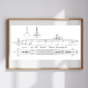 May include: A framed blueprint of a submarine, featuring detailed technical drawings in black and white. The print includes multiple views of the vessel, with text in Russian. The wooden frame adds a classic touch to this nautical-themed artwork.