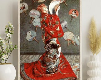 Pode incluir: Impressão emoldurada de uma mulher em um quimono vermelho segurando um leque. O quimono é adornado com padrões florais e de pássaros. O fundo apresenta leques decorativos e uma paleta de cores suaves, criando uma estética vintage. A impressão está em uma moldura de madeira.