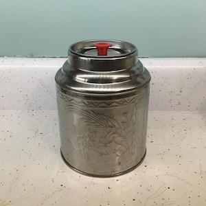 Embossed Vintage Stainless Steel Canister with Red Knob