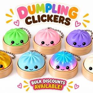 May include: Seven dumpling-shaped clickers with smiling faces, each set in a tan base with a metal keychain. The colors include green, pink, purple, yellow, blue, a multi-colored gradient, and white. Text reads DUMPLING CLICKERS and BULK DISCOUNTS AVAILABLE!