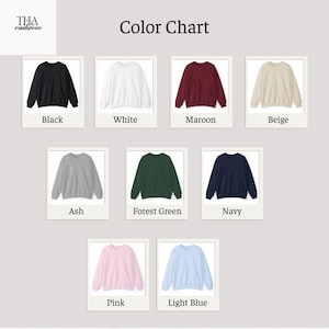 May include: Color chart displaying eight crewneck sweatshirts in various colors: black, white, maroon, beige, ash, forest green, navy, pink, and light blue. The text "Color Chart" is at the top.