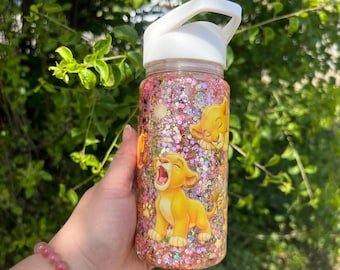 Vaso infantil rosa con purpurina y tapa abatible de 295 ml. Simbla El Rey León.