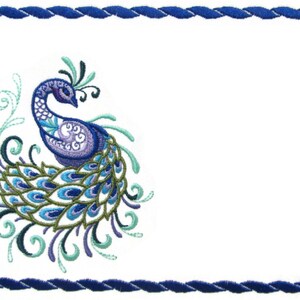 May include: White rectangular embroidered fabric with a blue rope-like border. The design features a peacock with blue, purple, and green feathers. The peacock is on the left side of the fabric.