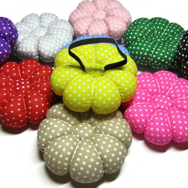 Wrist pin cushion in polka dot patterns in 10 different colors with elastic