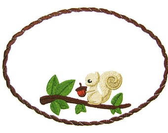 Squirrel and his Nut embroidered quilt label to customize with your personal message