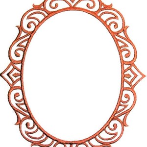 May include: An ornate, oval-shaped frame with a detailed, reddish-brown filigree design. The frame features decorative swirls, geometric shapes, and a crown-like element at the top. The center is empty, ready for a photo or artwork.