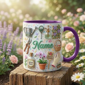 May include: A white ceramic mug with a purple handle and rim, decorated with gardening tools and flowers. The mug features the word "Name" in green script. A charming gift for a gardener.