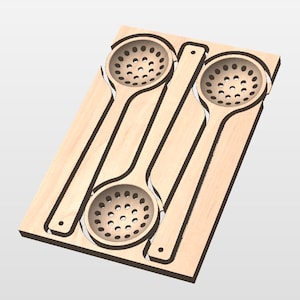 May include: A wooden kitchen utensil holder featuring three slotted spoons. The spoons are carved into a rectangular wooden base. The spoons have a round head with multiple holes and a long handle.