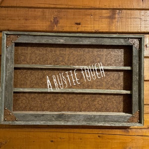 Belt Buckle Display Case - holds 15 buckles - tan tooled