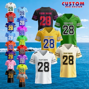May include: A collection of customizable football jerseys in various colors, including white, red, blue, and black. Each jersey features the number "28" and space for a team name or custom text. The image also includes the text "CUSTOM ADD DESIGN".