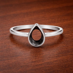 May include: A white ceramic mug with a black handle and the text "But First, Coffee" in a handwritten style. The mug is likely 4 inches tall and holds approximately 12 ounces of liquid.