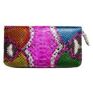 May include: A rectangular wallet with a colorful snakeskin pattern. The wallet features a zipper closure and a vibrant design with shades of orange, yellow, pink, green, and blue. The texture of the snakeskin is visible.