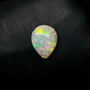 Ethiopian Opal 8.65 carats Cabochon Pear With Beautiful Fire With Cheap Price
