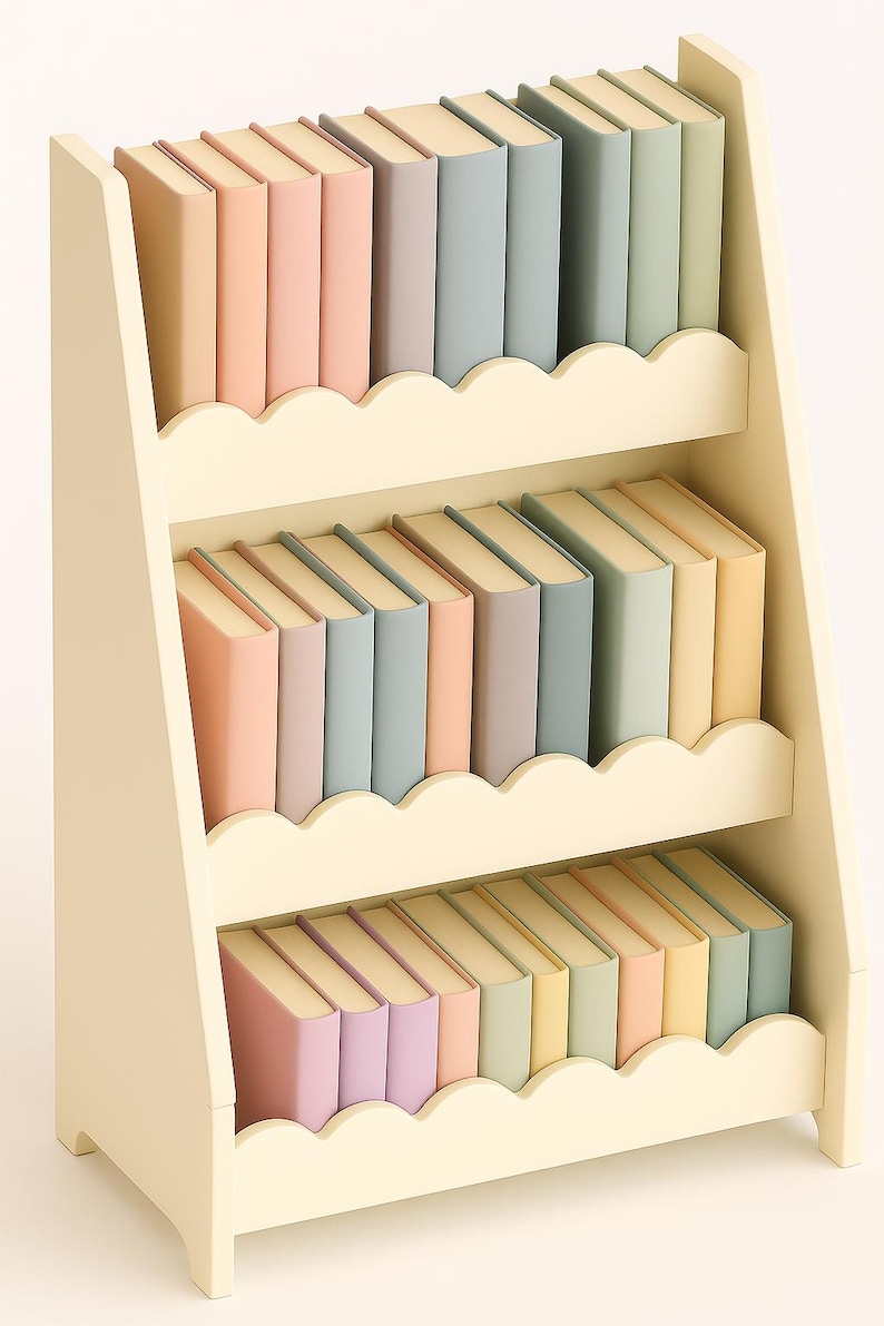 May include: A three-tiered, off-white bookshelf filled with pastel-colored books. The books are arranged in rows, with colors including pink, lavender, blue, and yellow. The bookshelf has a scalloped edge design.