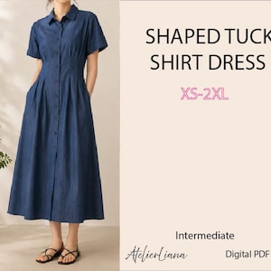 Puede incluir: Un vestido camisero de mezclilla azul oscuro con cuello, mangas cortas y botones frontales. El vestido presenta pliegues verticales en la cintura y una falda larga. Texto: SHAPED TUCK SHIRT DRESS, XS-2XL, Intermediate, AtelierLiana, Digital PDF Pattern.