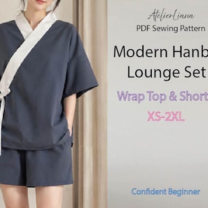 Puede incluir: Un conjunto de descanso gris oscuro que consta de una parte superior cruzada con cuello blanco y cierre de lazo lateral, junto con pantalones cortos a juego. El texto dice: AtelierLiana PDF Sewing Pattern Modern Hanbok Lounge Set Wrap Top & Shorts.