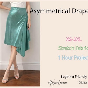May include: A metallic seafoam green skirt with an asymmetrical drape and hemline. The text reads: Asymmetrical Drape Skirt, XS-2XL, Stretch Fabric, 1 Hour Project, Beginner Friendly, AtelierLiana, Digital PDF Pattern. The skirt is worn with a white top.