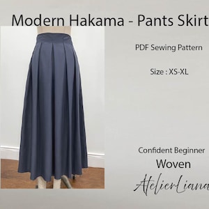 May include: A dark grey pleated hakama pants skirt shown on a mannequin. The text reads: Modern Hakama - Pants Skirt, PDF Sewing Pattern, Size: XS-XL, Confident Beginner, Woven, AtelierLiana. The garment features a high waistband and wide legs.