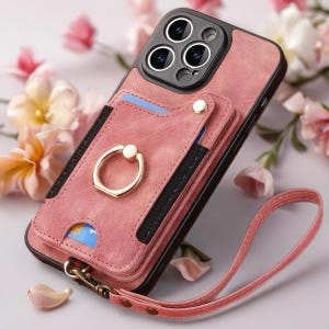 May include: Pink phone case with a cardholder and a gold ring grip. The case has a wrist strap and a black border. The case is designed to fit a smartphone and has a textured finish.